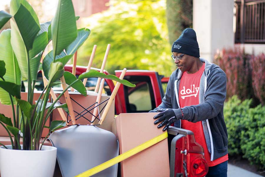 A Dolly Helper unloading a pickup truck